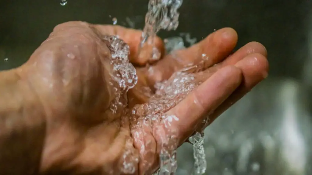 man washing his hands
