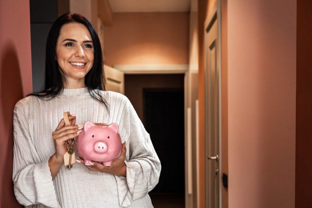 woman with a piggy bank